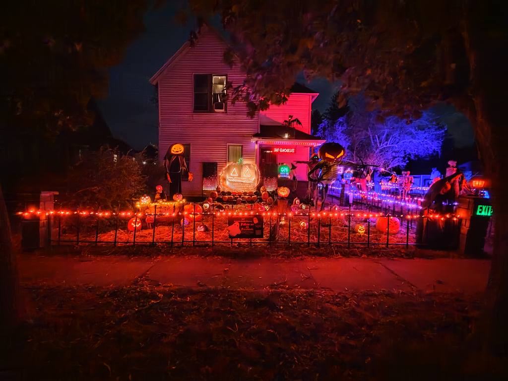 The completed 2025 Halloween display glowing at night