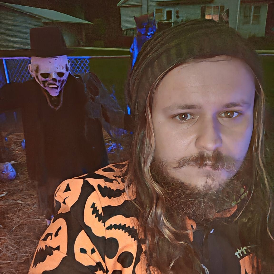 Ryan Gould, known as Mr. Ghould, standing in his Halloween display